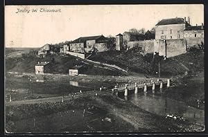 Carte postale Jaulny, vue partielle avec pont et Stadtmauer