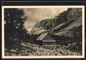 Ansichtskarte Koca pri Triglavskih jezerih, Berghütte gegen einen Gebirgskamm