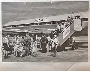 C1960s Glossy Black and White Press Photo of Passengers Boarding a British Overseas Air Corporati...