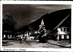 Bild des Verkufers fr Ansichtskarte / Postkarte Mitteltal Baiersbronn im Schwarzwald, Straenzug, Weihnachtsabend, Weihnachtsbaum zum Verkauf von akpool GmbH