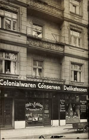 Foto Ansichtskarte / Postkarte Kolonialwarenhandlung, Holz und Kohlen, Hermann Riedel