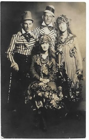 RPPC of two young women and two young men dressed up for Halloween in White City, Kansas