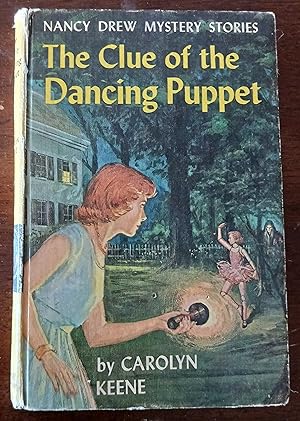 The Clue of the Dancing Puppet (Nancy Drew Mystery Stories)