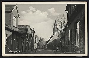 Ansichtskarte Badbergen i. H., Strassenpartie mit Blick zur Kirche