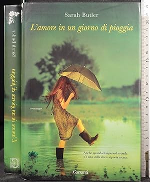 Seller image for L'AMORE IN UN GIORNO DI PIOGGIA for sale by Cartarum