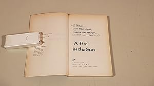Imagen del vendedor de A Fire In The Sun: Signed a la venta por SkylarkerBooks