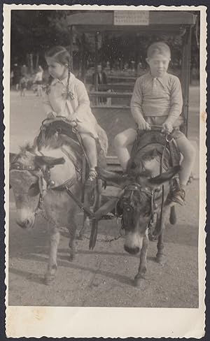 Childrens on donkeys drawn cart, 1943 Vintage photography