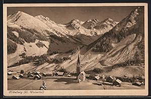 Ansichtskarte Mittelberg / Kl. Walsertal, Panorama mit Kirche im Winter