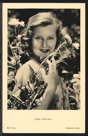 Ansichtskarte Schauspielerin Lilian Harvey mit Blumen posierend