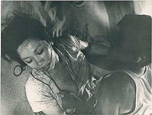 Bild des Verkufers fr Woman in the Dunes [Suna no onna] (Four original photographs from the 1964 film) zum Verkauf von Royal Books, Inc., ABAA