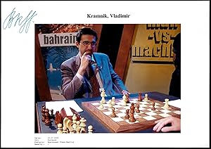 Printed representation of Kramnik with scene during competition games