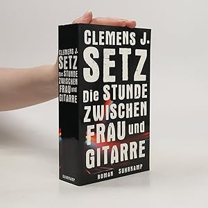Seller image for Die Stunde zwischen Frau und Gitarre for sale by Bookbot