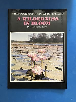Imagen del vendedor de A WILDERNESS IN BLOOM - WILDFLOWERS OF TROPICAL QUEENSLAND a la venta por Haddington Rare Books