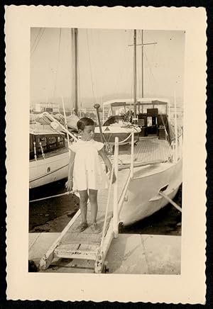 France 1953, Cannes, Little girl in the dock of the boat, Vintage photography