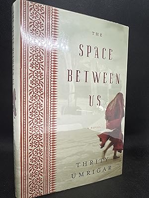 Imagen del vendedor de The Space Between Us (Signed First Edition) a la venta por Dan Pope Books