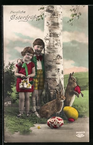 Ansichtskarte Osterhasen und Kinder mit Eiern am Wegesrand