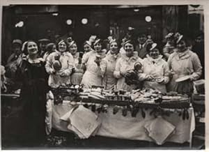 Photograph of sales-women on the Rue de Commerce, Paris