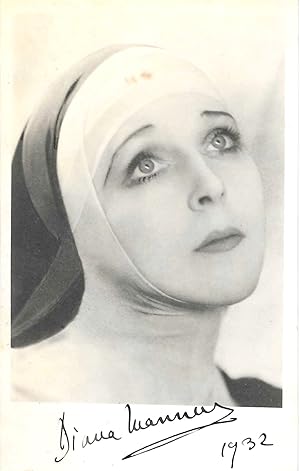 Image du vendeur pour [Lady Diana Cooper, English society beauty, actress and memoirist.] Autograph Signature on publicity photograph of her dressed as a nun, from the play 'The Miracle'. mis en vente par Richard M. Ford Ltd