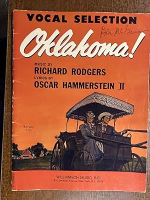 Image du vendeur pour OKLAHOMA! ( Vocal Selections song book) including 7 songs from the original Broadway show including: I CAIN'T SAY NO, OUT OF MY DREAMS, PEOPLE WILL SAY WE'RE IN LOVE, OH WHAT A BEAUTIFUL MORNING, others. mis en vente par Elena