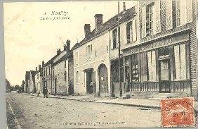 Bild des Verkufers fr Carte Postale Ancienne - NEUILLY - La rue principale. zum Verkauf von JOIE DE LIRE