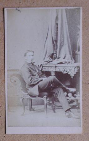 Bild des Verkufers fr Carte De Visite Photograph. Portrait of a Seated Young Man. zum Verkauf von N. G. Lawrie Books