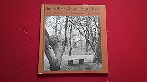 STONE BENCH IN AN EMPTY PARK
