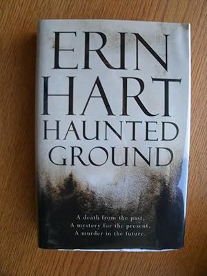 Seller image for Haunted Ground for sale by Scene of the Crime, ABAC, IOBA