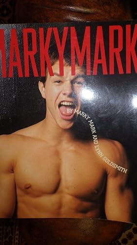 Imagen del vendedor de MARKY MARK , SIGNED ON BACK Cover in Black By MARKY MARK Wearing Red Baseball Hat & Flexing His Muscles, Filled with Glorious Color Photos of This Former Rapp Star Now Actor Mark Whalberg. Pictorial Autobio of the Rapper Turned Movie Star, Actor Mark Wah a la venta por Bluff Park Rare Books