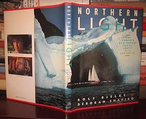 Seller image for NORTHERN LIGHT One Couple's Epic Voyage from the Arctic to the Antarctic for sale by Rare Book Cellar