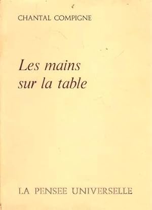 Les mains sur la table