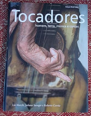 Tocadores / homem,terra,musica e cordas