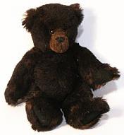 Bild des Verkufers fr Chocolate brown mohair teddy bear. zum Verkauf von Wittenborn Art Books