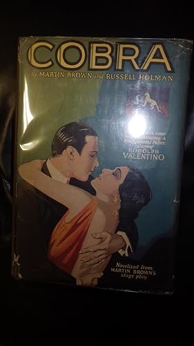 Seller image for Cobra ( Illustrated with scenes from the Photoplay a Ritz-Paramount Moving Picture starring Unbelievably Handsome Rudolph Valentino who is Pictured holding Beautiful woman, Nita Naldi on Beautifully Colored Cover DJ ) The Complete Novel for sale by Bluff Park Rare Books