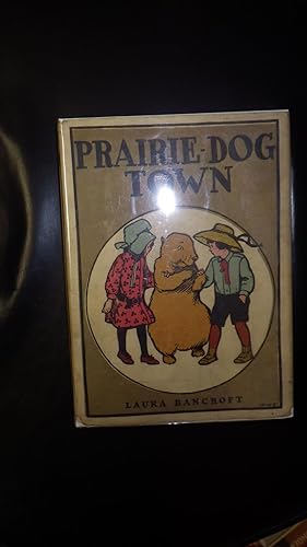 Imagen del vendedor de Prairie-Dog Town By Laura Bancroft, Illustrated By Maginel Wright Enright, Frank Lloyd Wright's Sister, Series # 3, ,WITH Rare COLOR DustJacket of Prairie Dog & Little Boy with Green Shirt & Black Shorts & Red Tie & Girl in Red Dress & Bonnet with Red S a la venta por Bluff Park Rare Books
