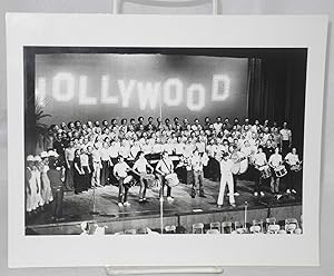 Seller image for Publicity photo of The San Francisco Gay Freedom day Marching band and Twirling Corps, The San Francisco Gay Men's Chorus in concert at Hollywood High School for sale by Bolerium Books Inc.