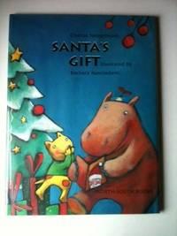 Bild des Verkufers fr Santa's Gift zum Verkauf von WellRead Books A.B.A.A.