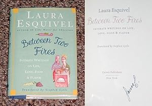 Seller image for BETWEEN TWO FIRES: INTIMATE WRITINGS ON LIFE, LOVE, FOOD & FLAVOR - Scarce Fine Copy of The First American Edition/First Printing: Signed by Laura Esquivel - SIGNED ON THE TITLE PAGE for sale by ModernRare