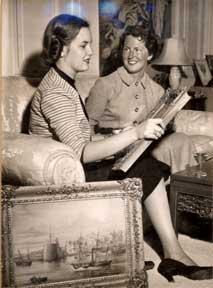 Two Young Girls Admiring Paintings.