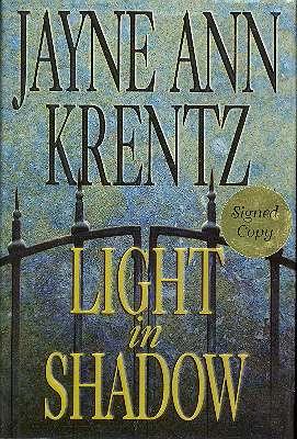 Light in Shadow : A Whispering Springs Novel.