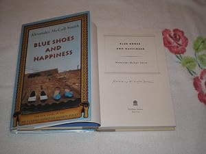 Image du vendeur pour Blue Shoes And Happiness: The New Novel In The No. 1 Ladies' Detective Agency Series: Signed mis en vente par SkylarkerBooks