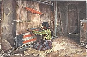 A Navajo Woman Weaving; color postcard