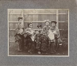 Photograph of Two Japanese Women with a Teenager and Five Children