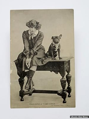 Image du vendeur pour Carte postale rdige et signe Colette Willy, illustre d'un portrait photographique de Colette en Claudine avec Toby-chien mis en vente par Librairie Alain Brieux