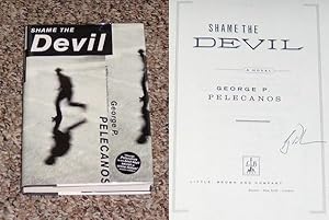Seller image for SHAME THE DEVIL - Scarce Fine Copy of The First Hardcover Edition/First Printing: Signed by George P. Pelecanos - SIGNED ON THE TITLE PAGE for sale by ModernRare