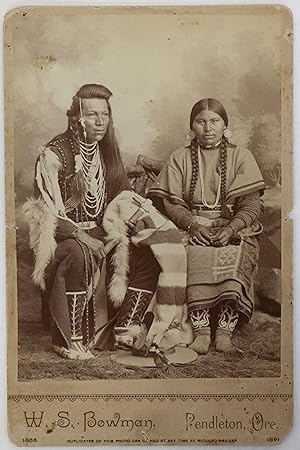 Seated First Nations Couple with Elaborately Beaded Costumes