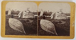 Original Stereo View. "736 Chippeway Wigwams Constructed of Birch Bark" and Canoe.