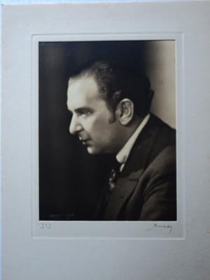 Bild des Verkufers fr A SUPERB SEPIA TONED PHOTOGRAPH PORTRAIT OF THE GREAT CLASSICAL CONDUCTOR FRITZ REINER BY NICKOLAS MURAY, DATED AND SIGNED BY THE PHOTOGRAPHER zum Verkauf von Blue Mountain Books & Manuscripts, Ltd.