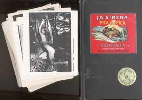 Personal notebook, two postcards, and a stack of reproductions of the photographer's work.
