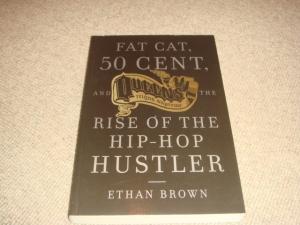 Bild des Verkufers fr Fat Cat, 50 Cent and the Rise of the Hip-hop Hustler (1st edition paperback) zum Verkauf von 84 Charing Cross Road Books, IOBA