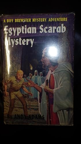 Imagen del vendedor de Egyptian Scarab Mystery SERIES #9 of 13 , Biff Brewster Adventure, In RARE Color Dustjacket of Blonde Boy in Khaki Outfit & Wise Looking Man with Staff in White Turbank & Red Underneath at Late Night Ceremony in Ancient Temple With Torches,This is a Very a la venta por Bluff Park Rare Books
